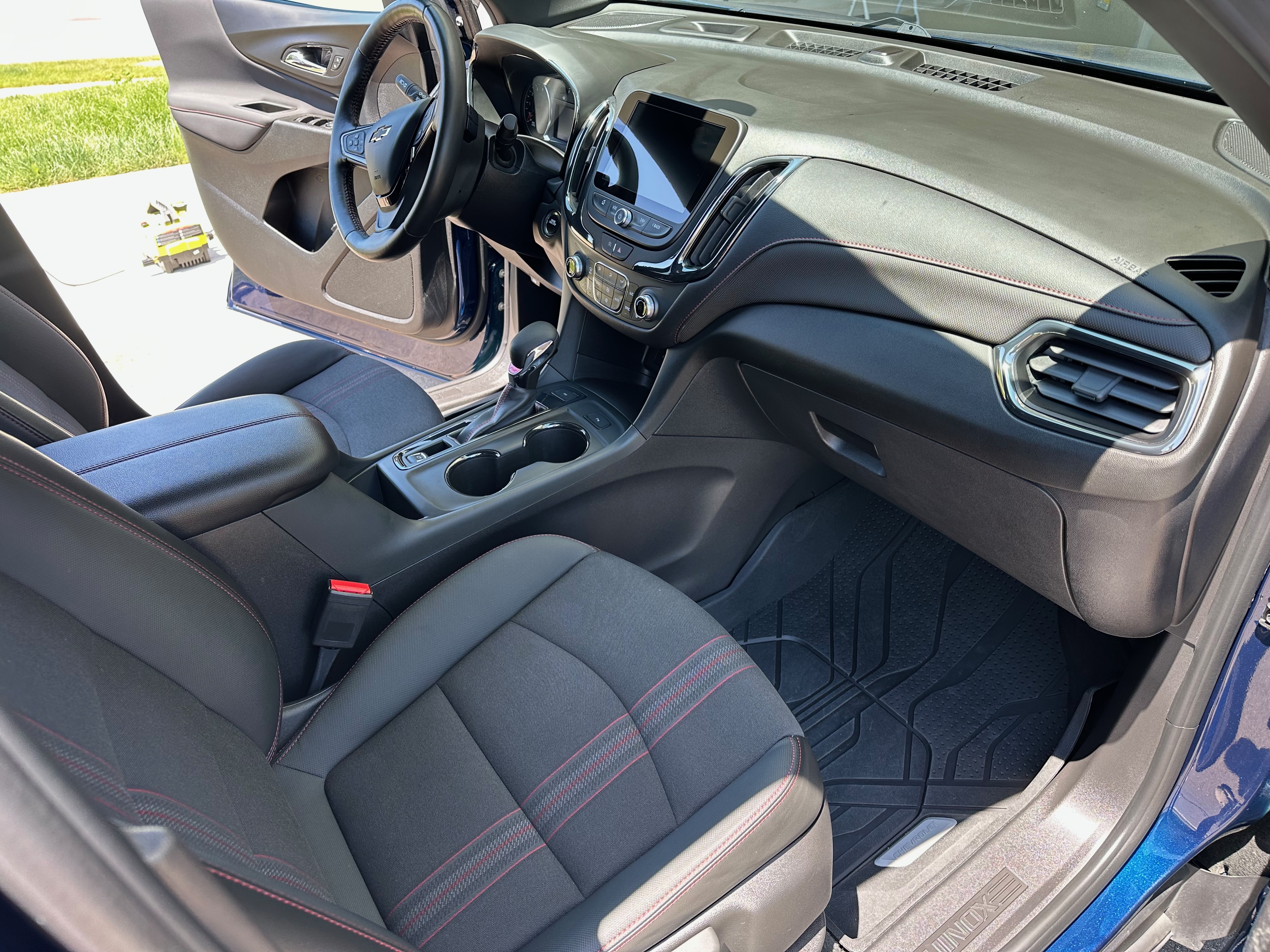 Chevrolet Equinox Interior Detail - Full interior detail on a daily driver Equinox — deep vacuuming, light stain treatment, surface cleaning, and UV protection.